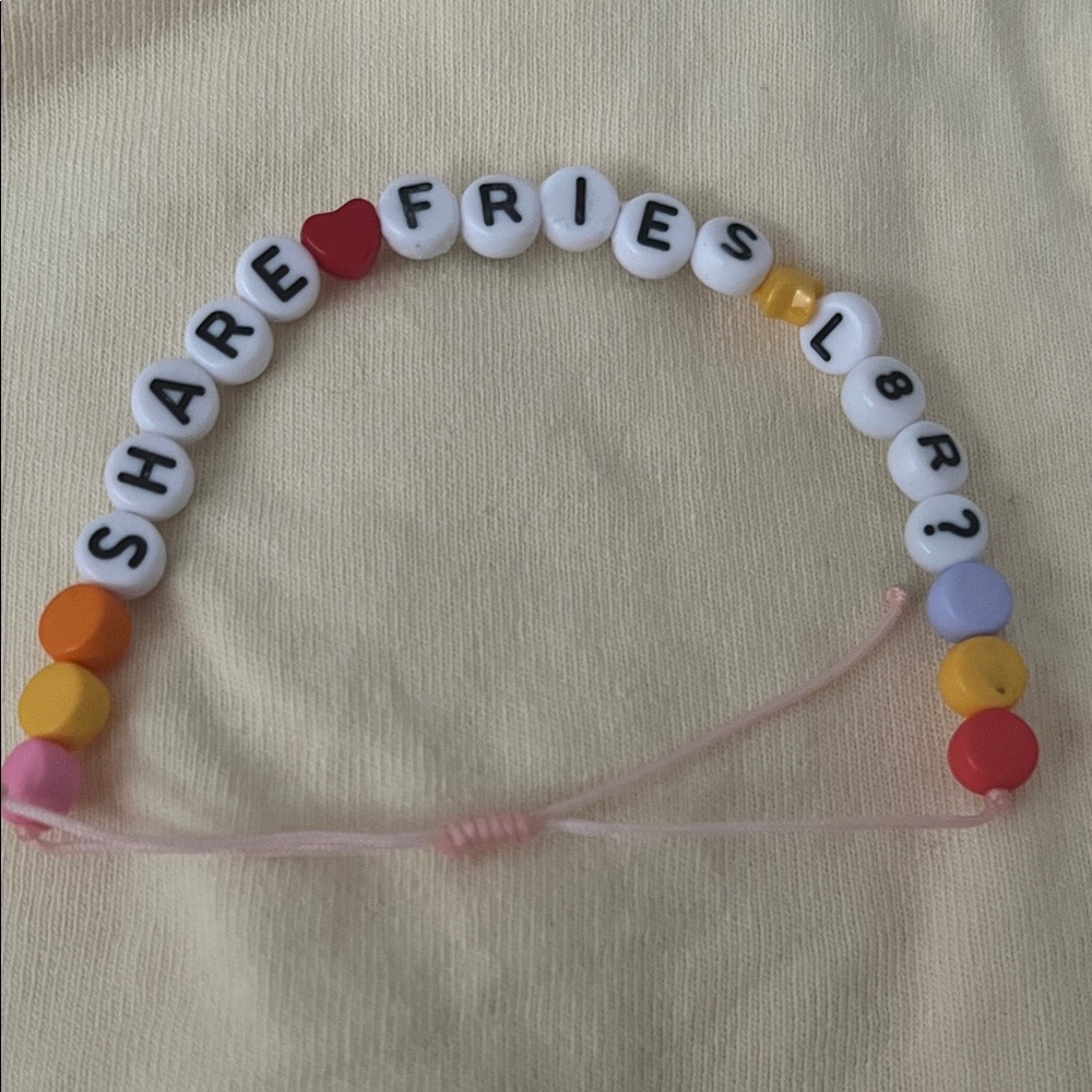 Taylor swift friendship bracelet from McDonald’s with 'Share Fries' Message